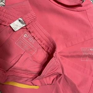 Coral figs scrubs top is medium bottom is small petite